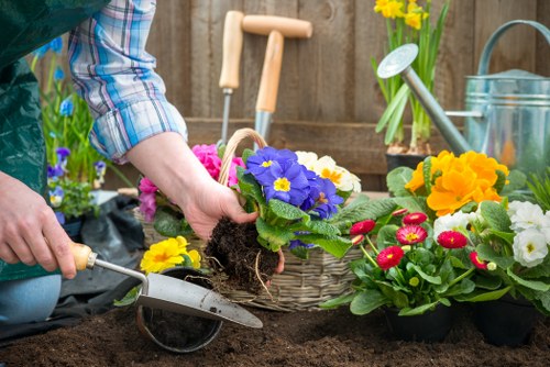Workers planting in a community garden representing ethical garden care